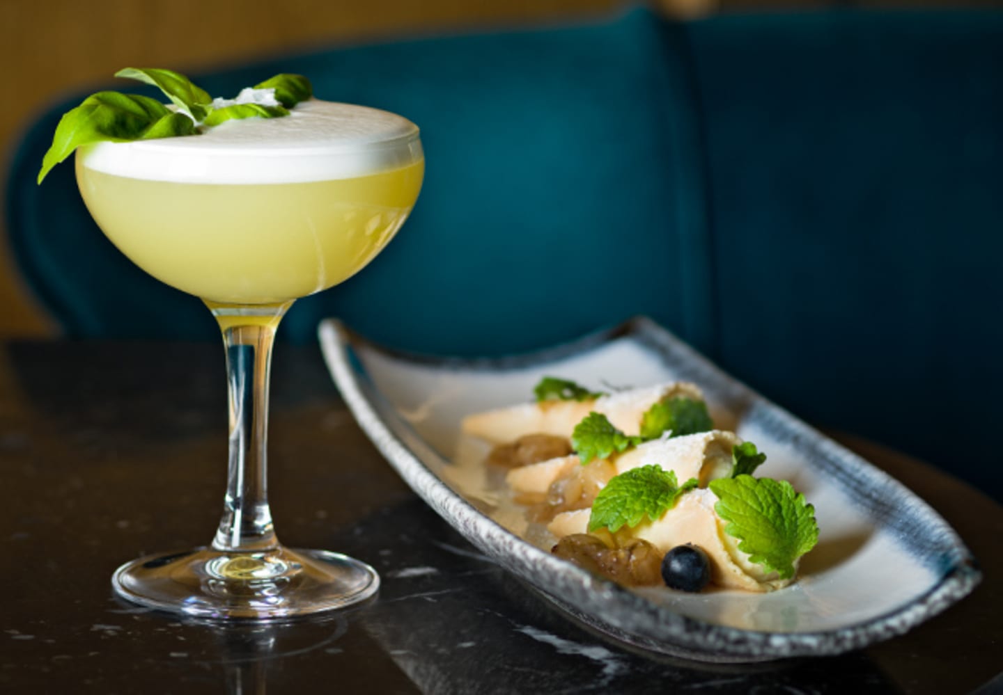 Nyfiken i en strut och drinken Betty Green