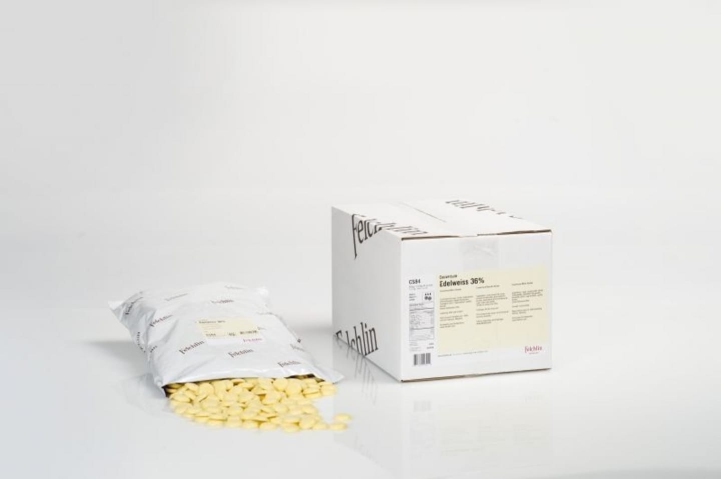 Felchlin Rondo Felchlin edelweiss 36% vit 2kg rondo - Bakchoklad | Martin & Servera